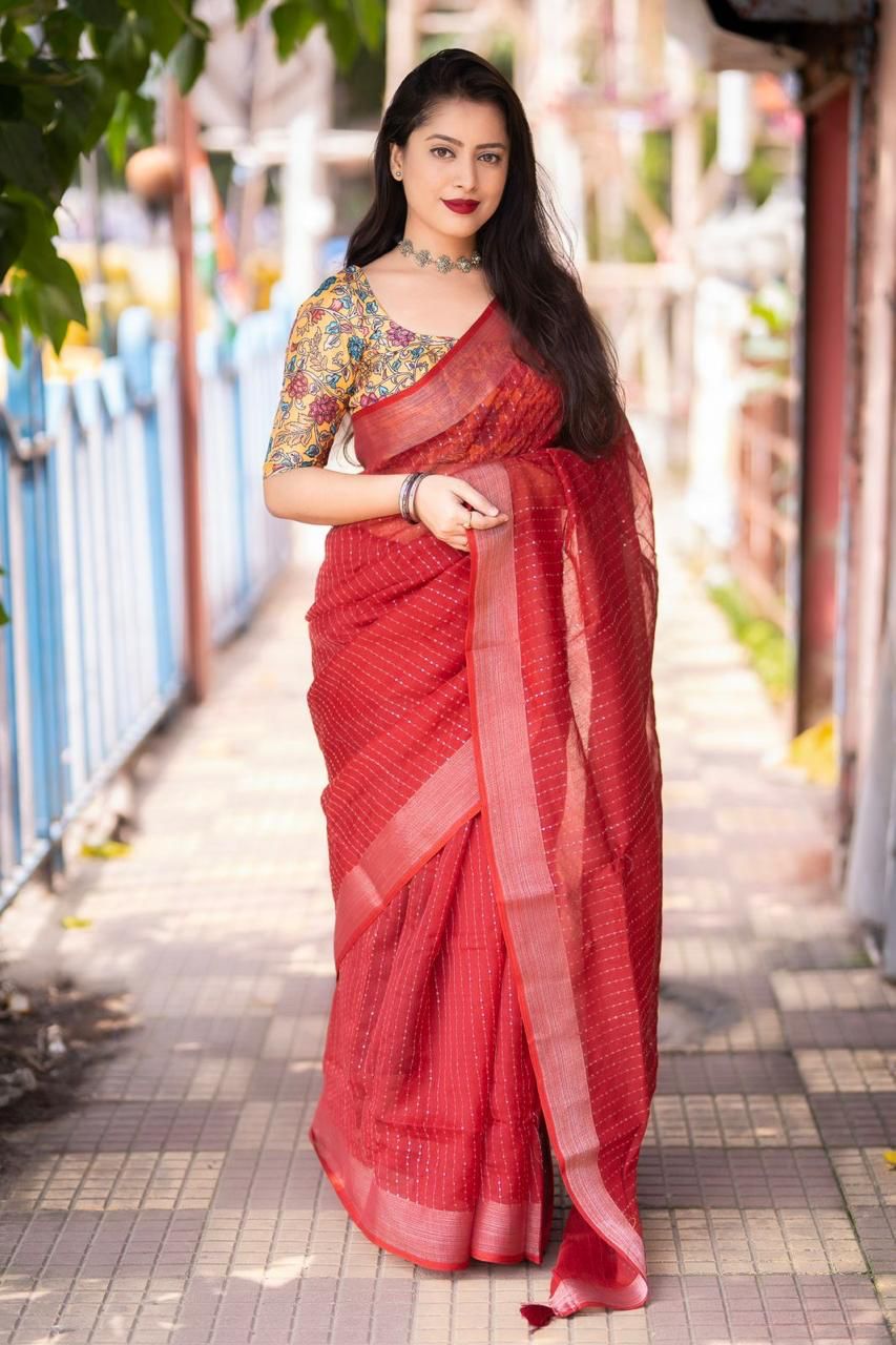 "Elegant Linen Saree with Golden Pattu Border and Sequence Work"