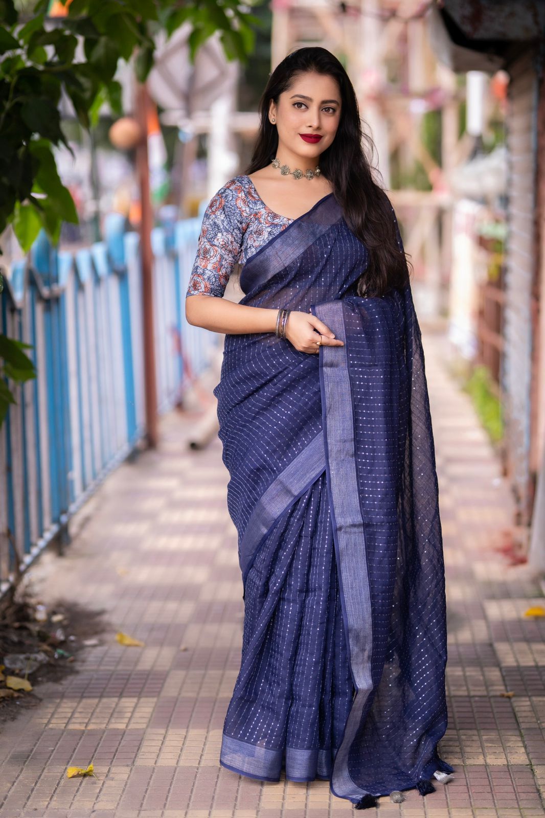 "Elegant Linen Saree with Golden Pattu Border and Sequence Work"