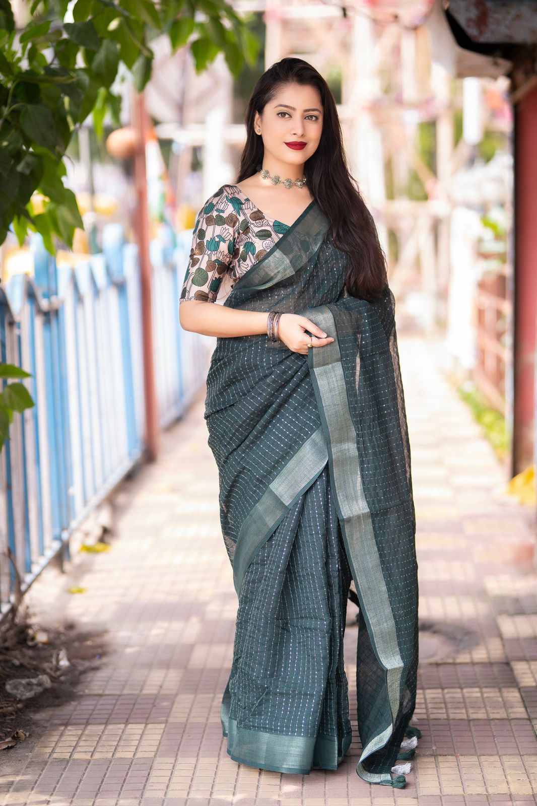 "Elegant Linen Saree with Golden Pattu Border and Sequence Work"