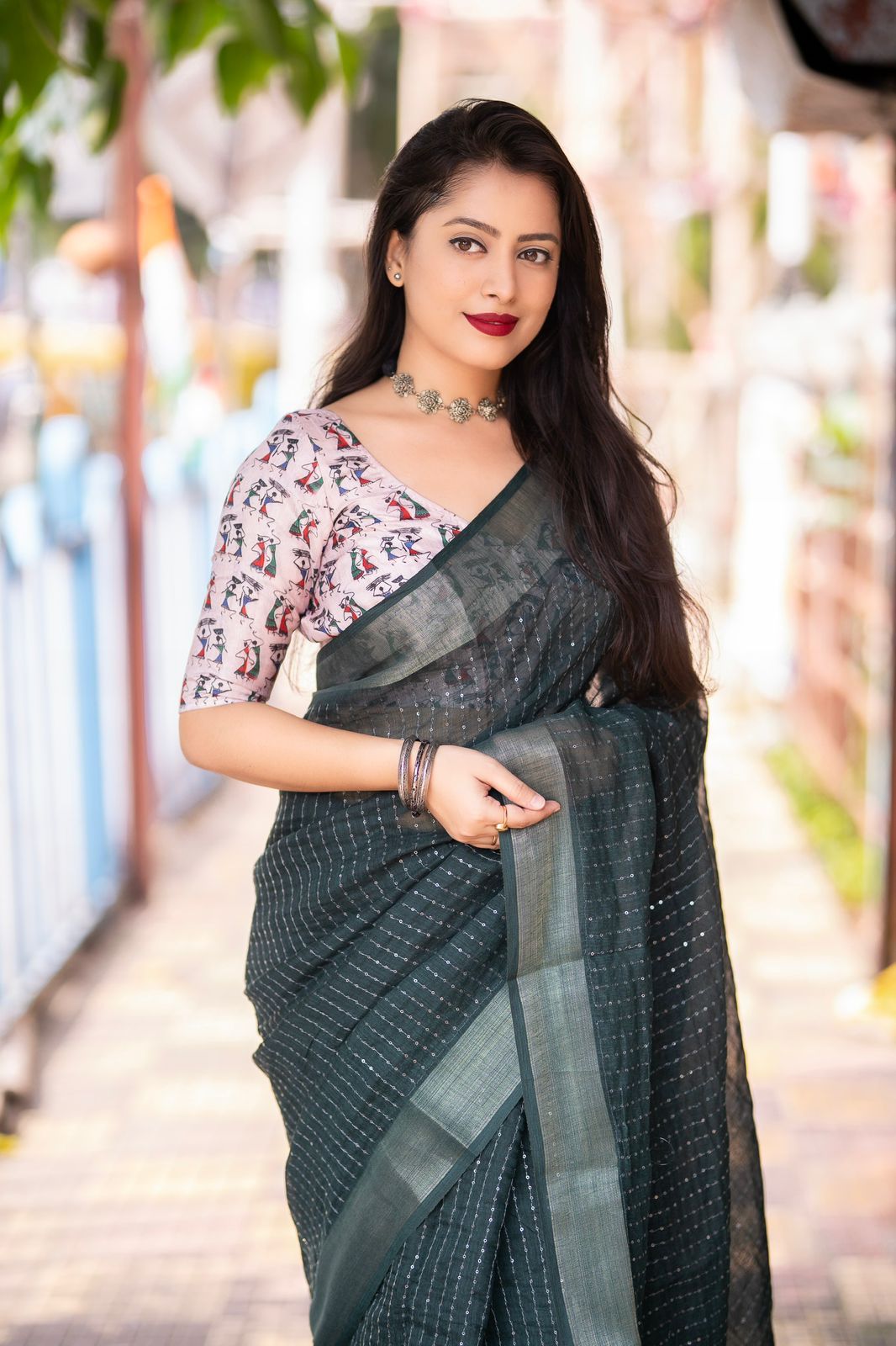 "Elegant Linen Saree with Golden Pattu Border and Sequence Work"