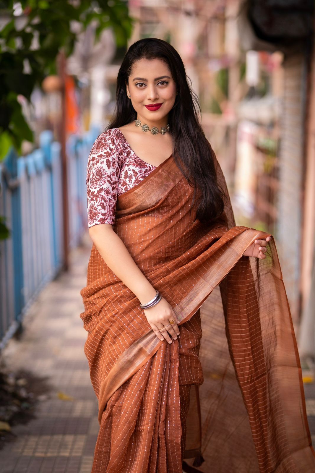 "Elegant Linen Saree with Golden Pattu Border and Sequence Work"