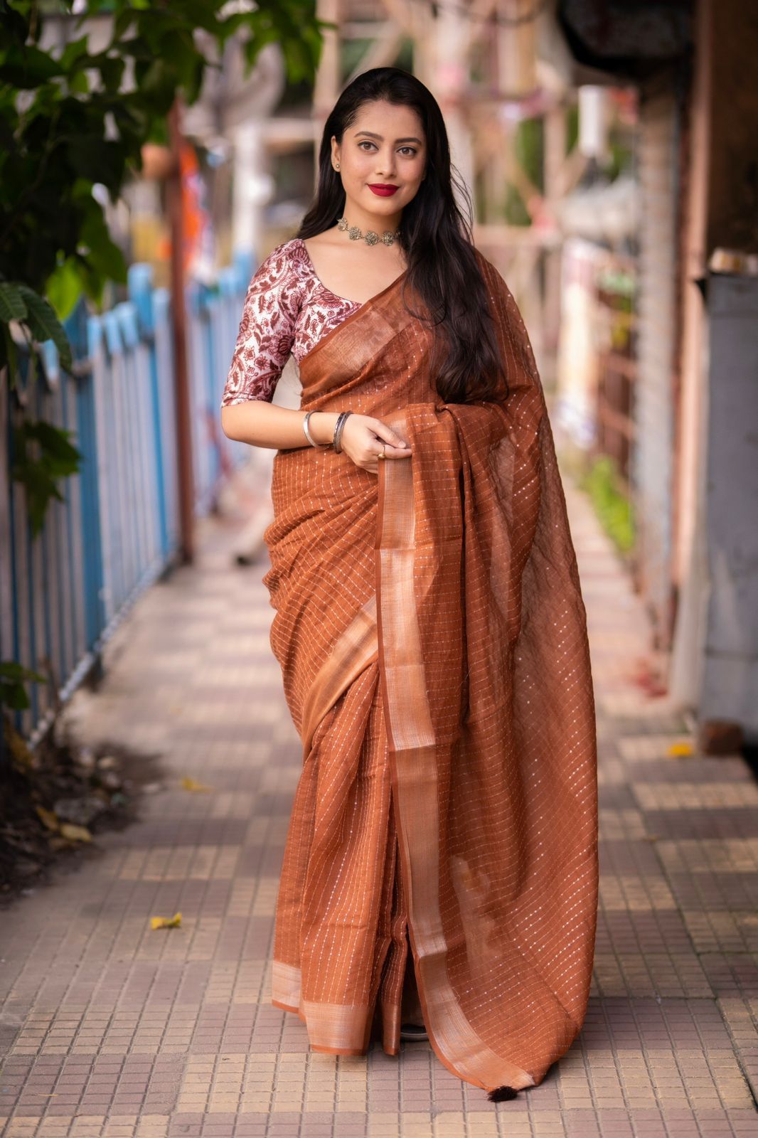 "Elegant Linen Saree with Golden Pattu Border and Sequence Work"