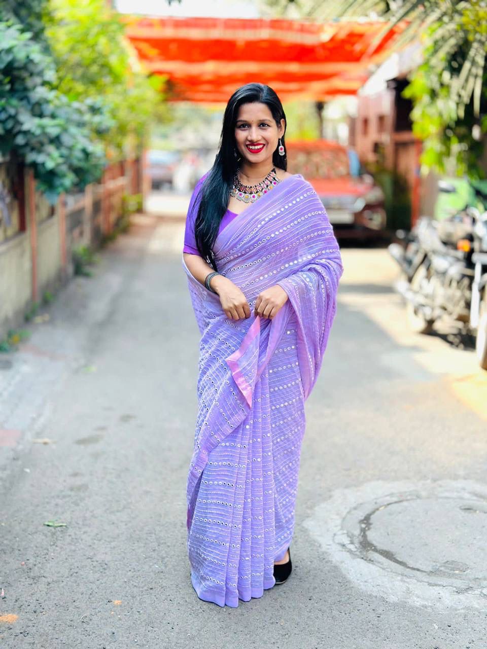 "Bollywood Elegance: Embroidered Georgette Saree with Mirror Work"