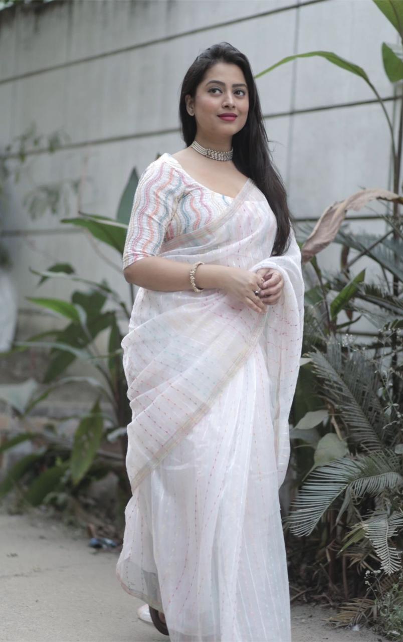 "Kerala Organza White Saree: Lightweight Elegance with Multicolor Thread Design"