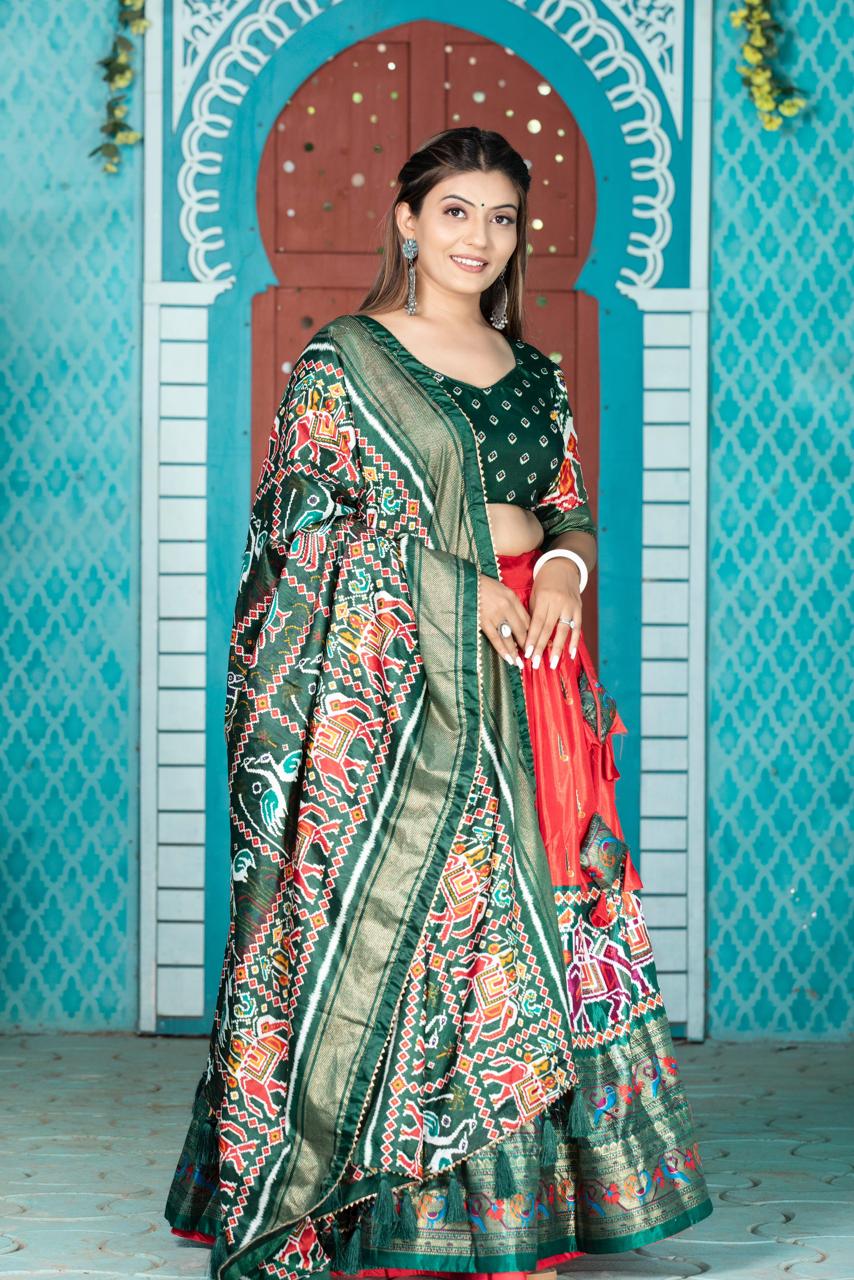 "Paithani Patola Perfection: Vibrant Dola Silk Lehenga Ensemble"