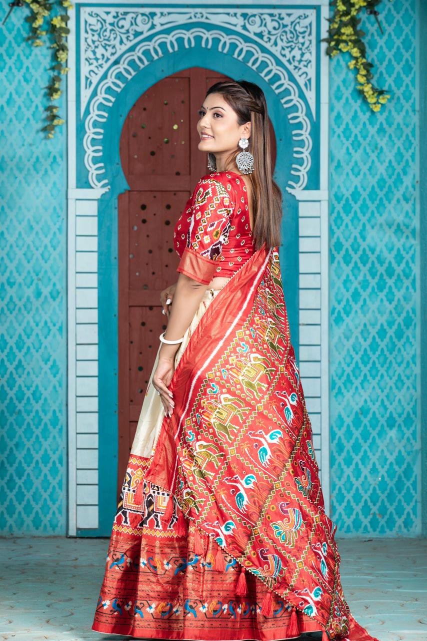 "Paithani Patola Perfection: Vibrant Dola Silk Lehenga Ensemble"