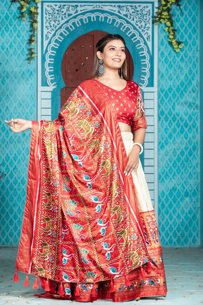 "Paithani Patola Perfection: Vibrant Dola Silk Lehenga Ensemble"