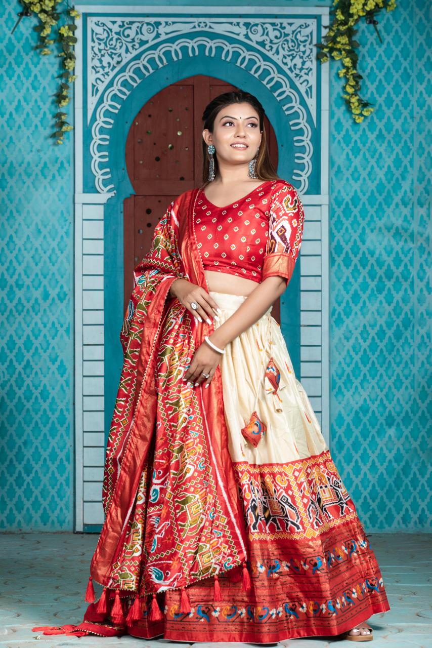 "Paithani Patola Perfection: Vibrant Dola Silk Lehenga Ensemble"