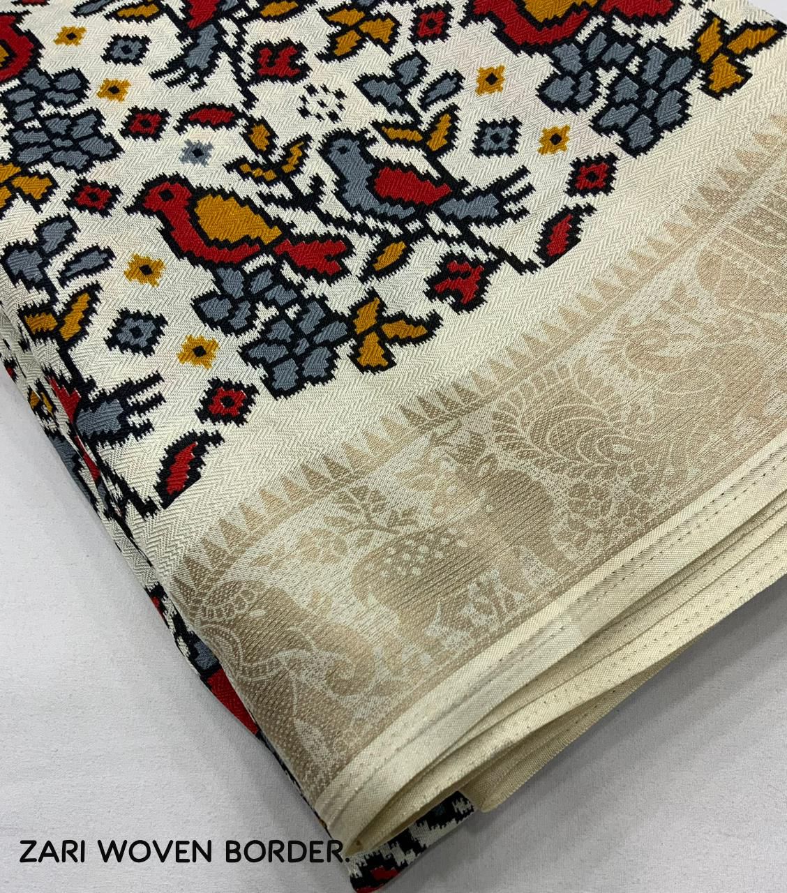 "Ivory White Pashmina Ikkat Style Printed Saree with Zari Border and Unstitched Blouse"