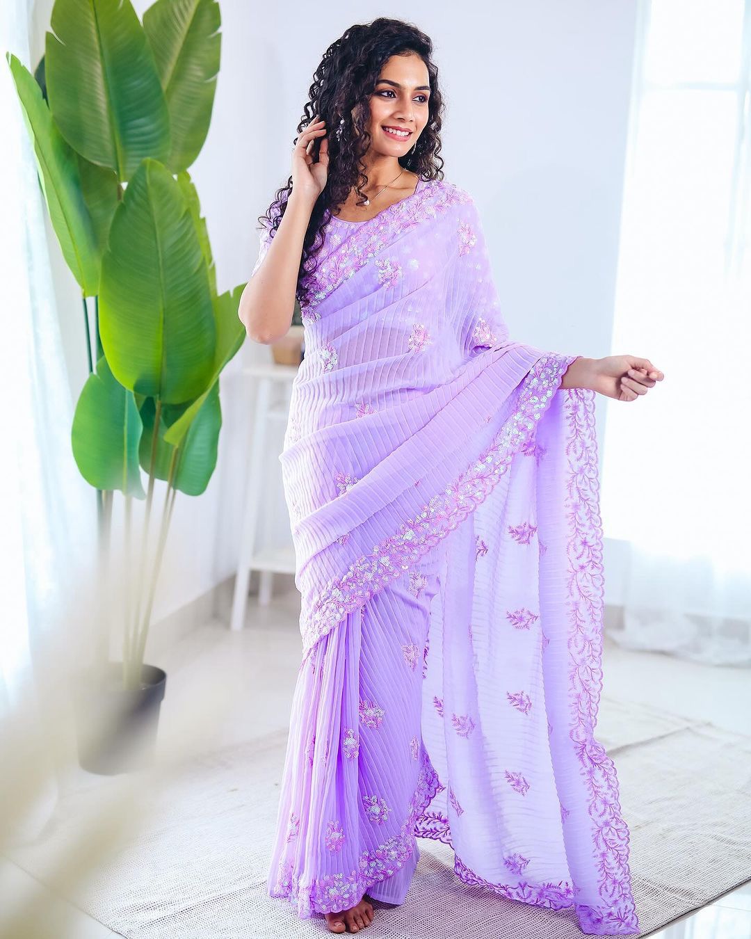 "Crushed Georgette Saree with Intricate Sequence Embellishments"