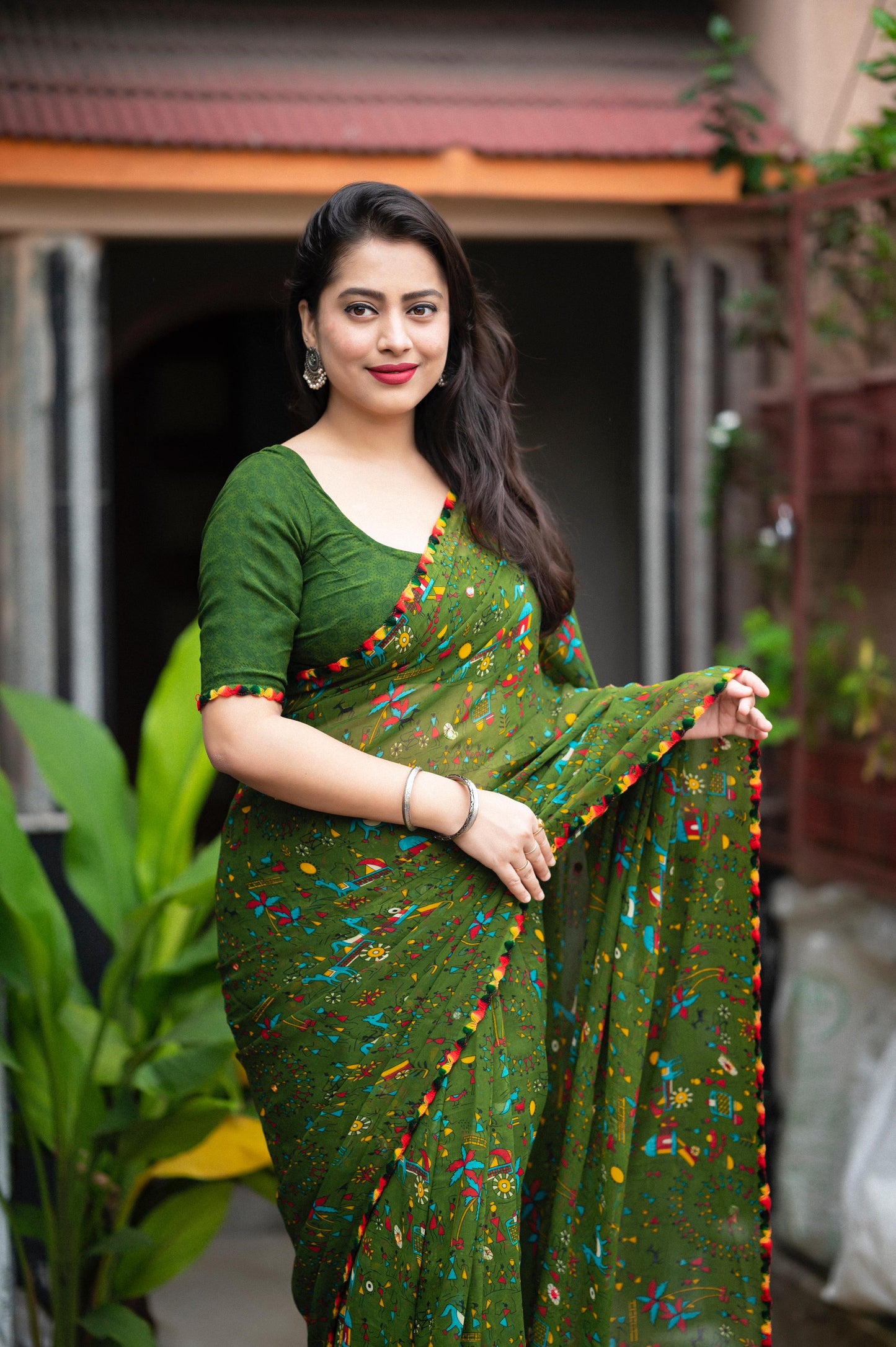 Fancy Worli & Cartoon Prints with Aari Mirror Work Georgette Saree with Blouse