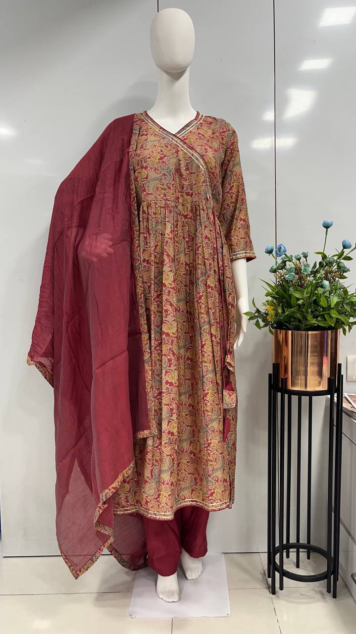 Luxurious Gajari Colour Kurta Set with Viscose Modal Dupatta and Bottom Wear
