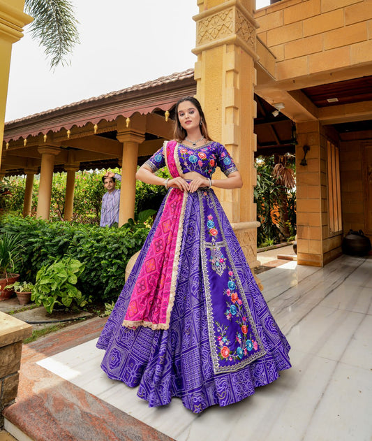 "Iris Purple Elegance: Women's Purple Lehenga Choli Set with Free Men's Kurta - Hand Embroidery, Badhani Print, and Georgette Dupatta"