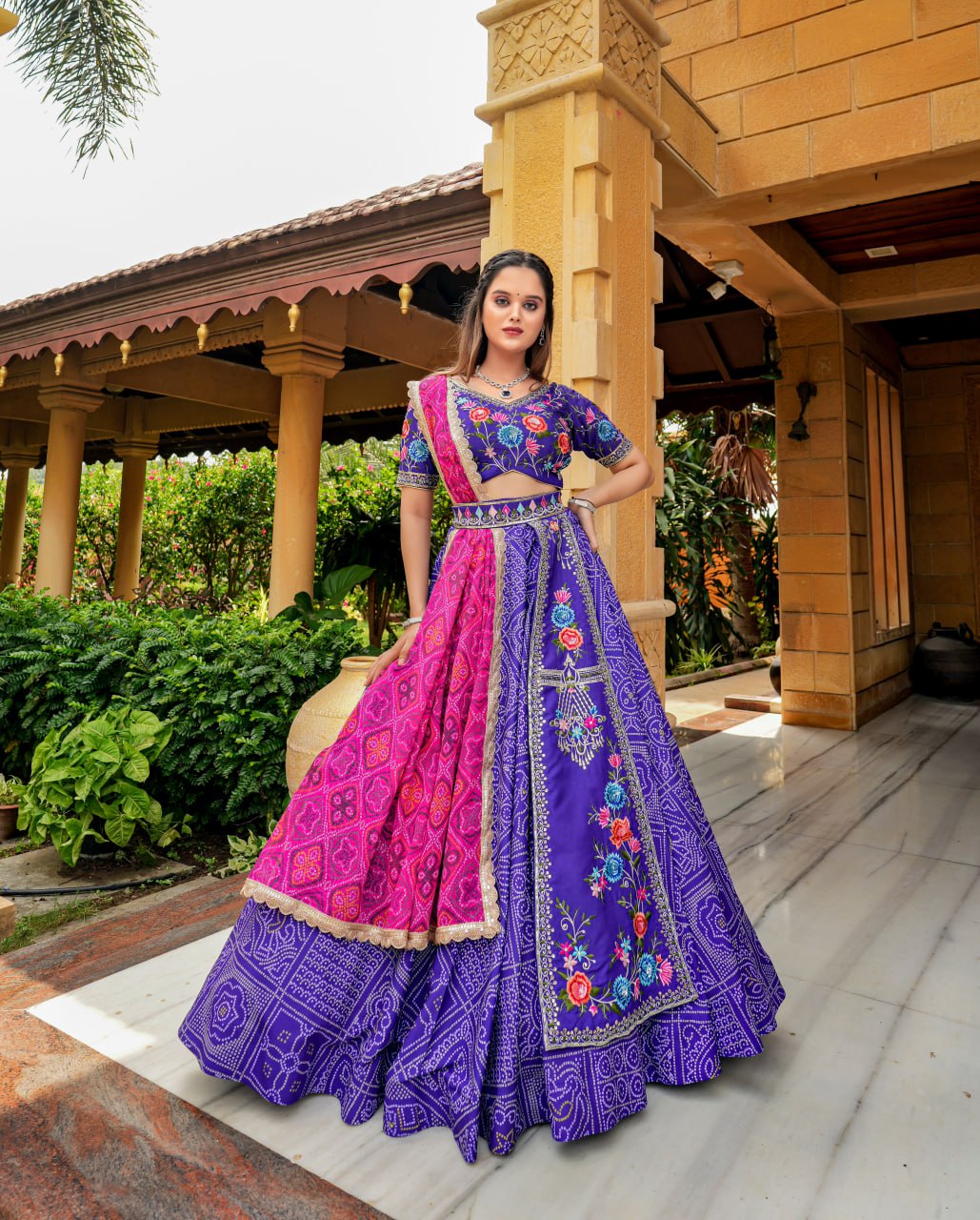 "Iris Purple Elegance: Women's Purple Lehenga Choli Set with Free Men's Kurta - Hand Embroidery, Badhani Print, and Georgette Dupatta"