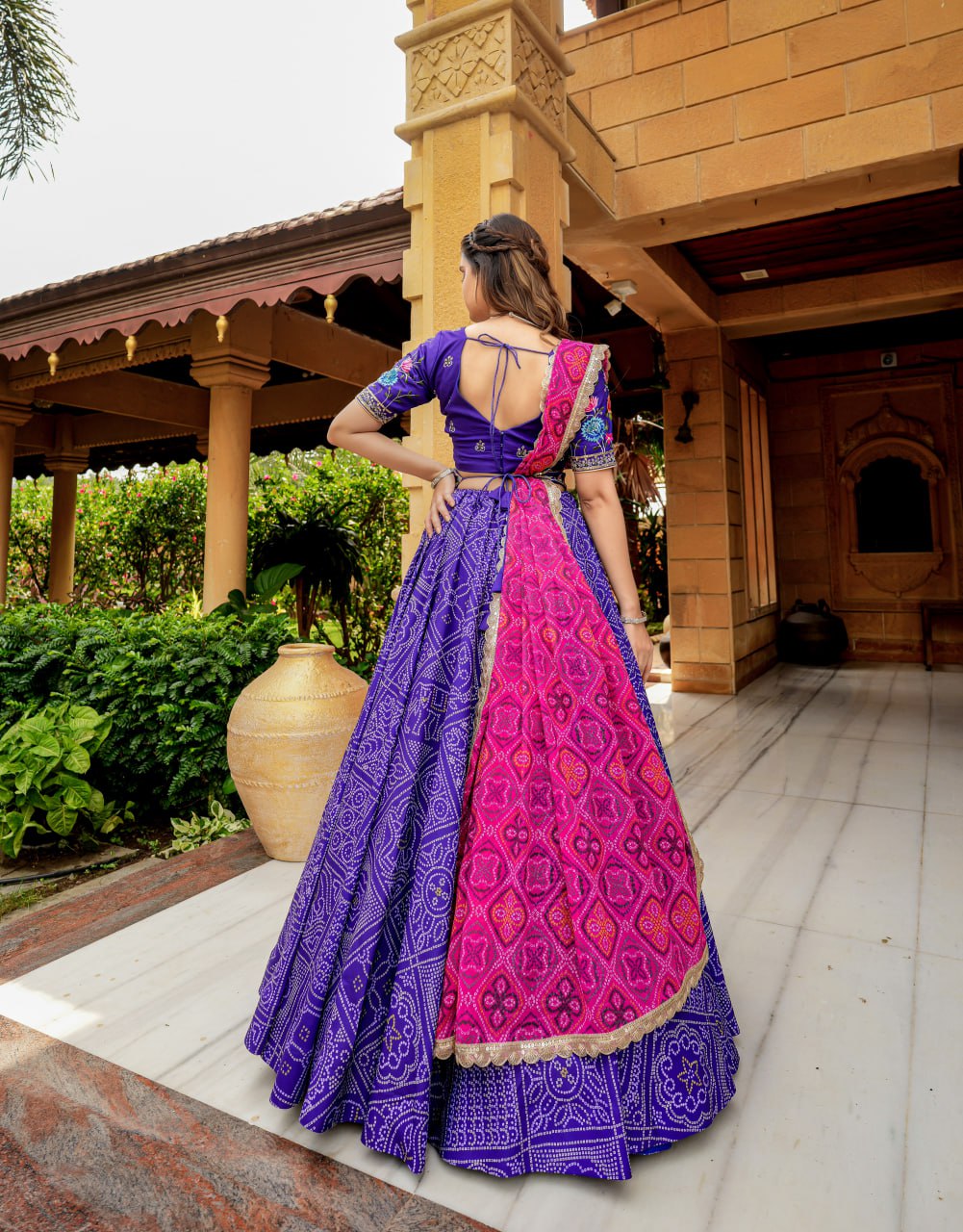 "Iris Purple Elegance: Women's Purple Lehenga Choli Set with Free Men's Kurta - Hand Embroidery, Badhani Print, and Georgette Dupatta"