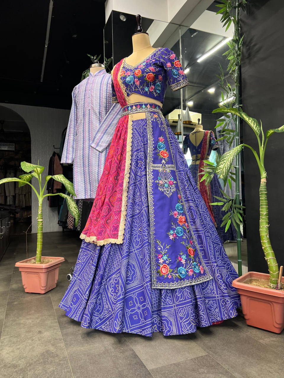 "Iris Purple Elegance: Women's Purple Lehenga Choli Set with Free Men's Kurta - Hand Embroidery, Badhani Print, and Georgette Dupatta"