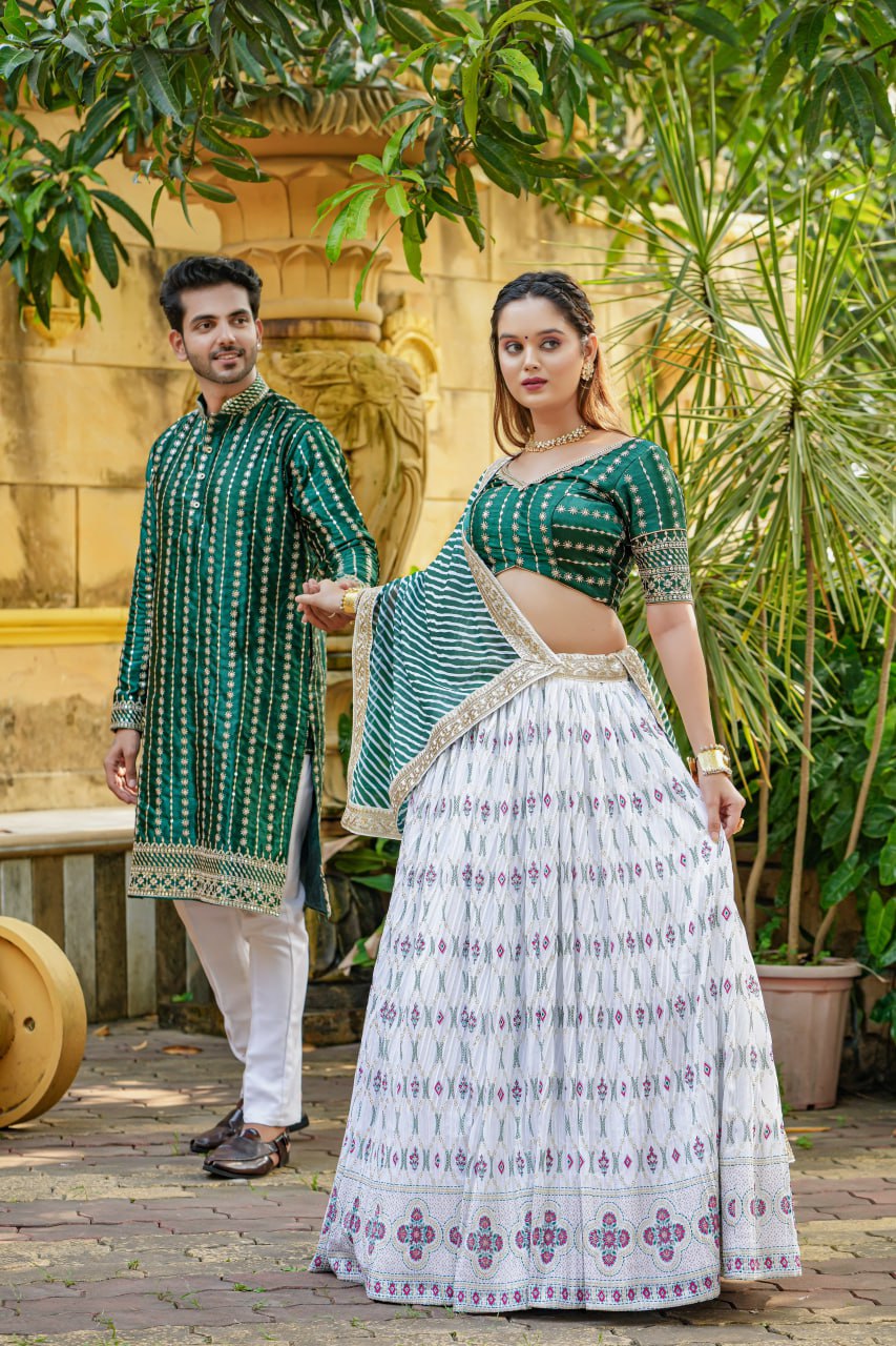 "White Angel Lahenga Choli & Men's Kurta Set: Elegant White & Green Ensemble for Couples"