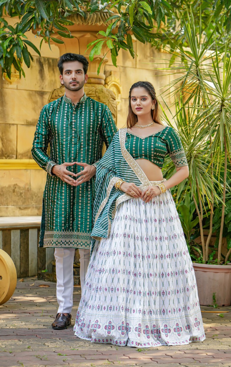 "White Angel Lahenga Choli & Men's Kurta Set: Elegant White & Green Ensemble for Couples"