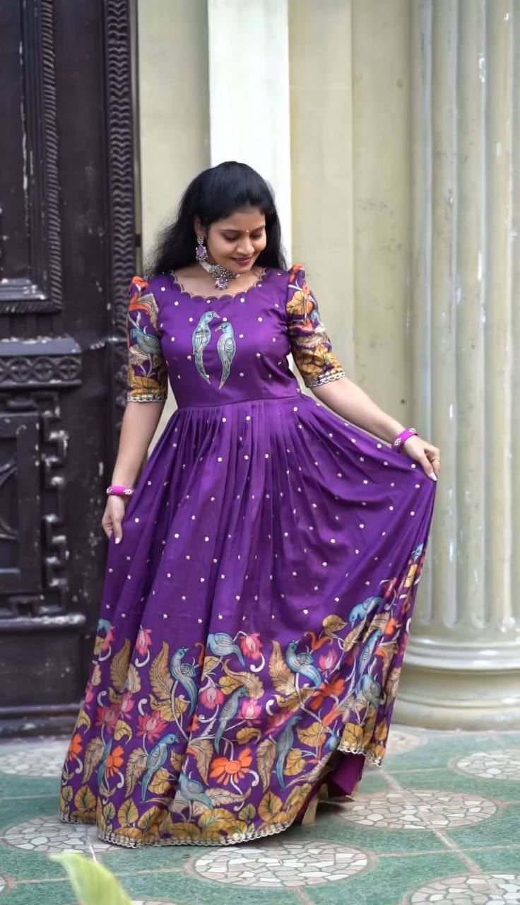 "Kalamkari Majesty: Chent Creape Fabric Gown with Traditional Print