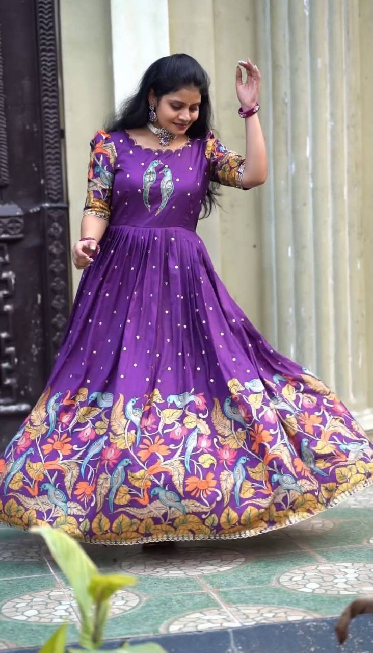 "Kalamkari Majesty: Chent Creape Fabric Gown with Traditional Print