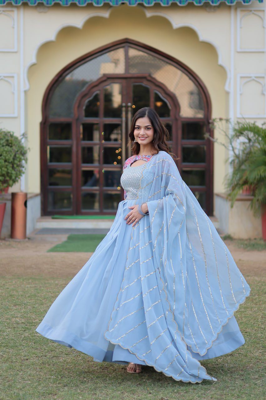 "Floral Fantasy: Lavender & Sky Blue Premium Georgette Gown with Embroidered Dupatta"