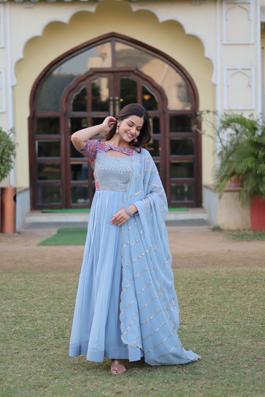 "Floral Fantasy: Lavender & Sky Blue Premium Georgette Gown with Embroidered Dupatta"