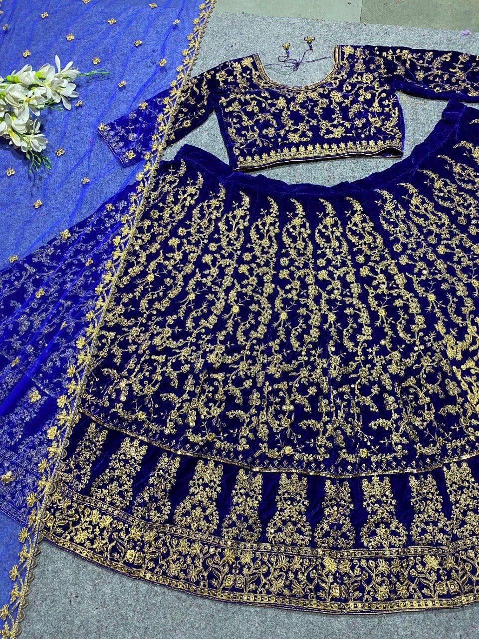"Embroidered Velvet Lehenga Choli: Opulent Navy Blue & Rani Pink Ensemble"