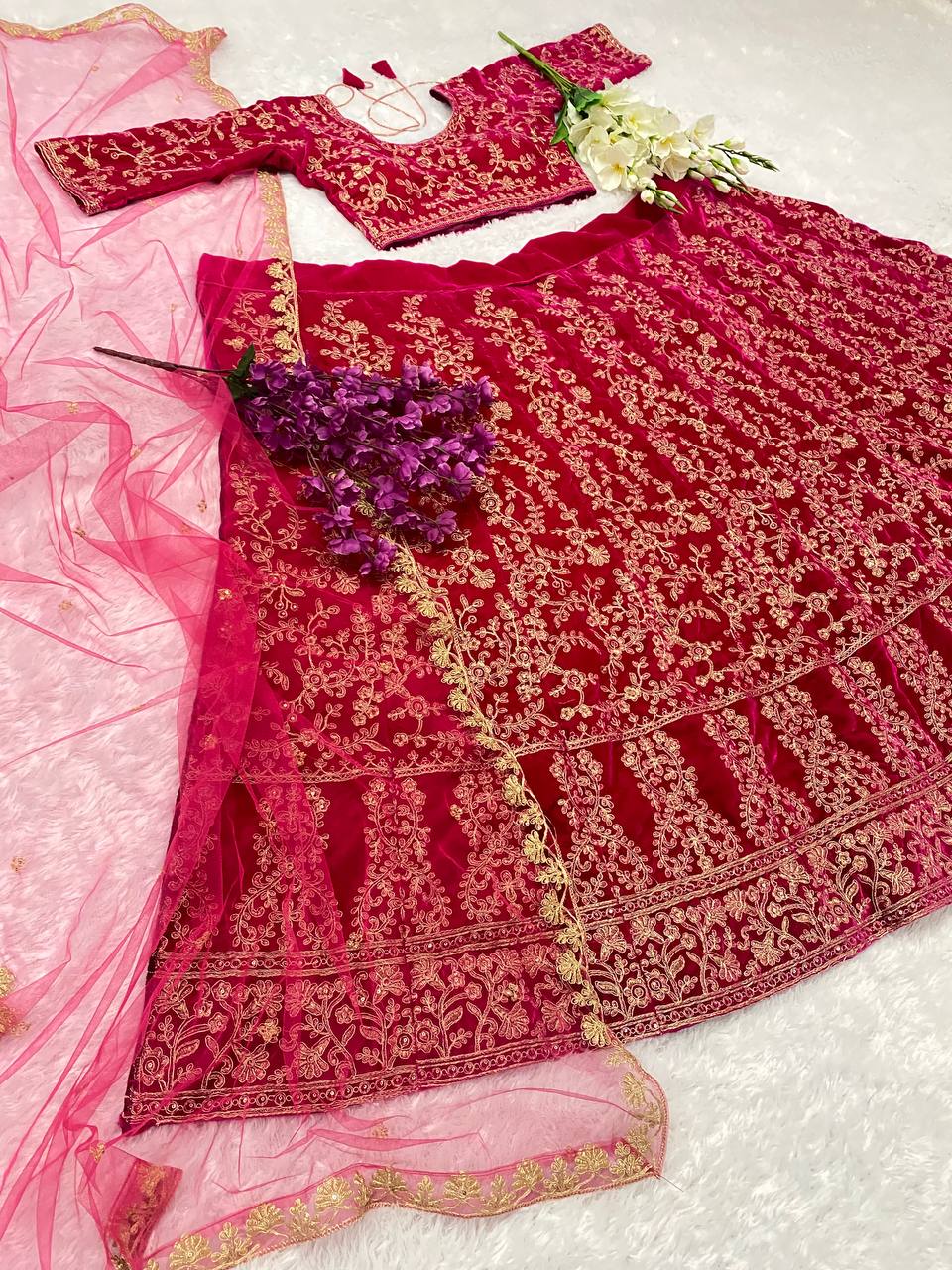 "Embroidered Velvet Lehenga Choli: Opulent Navy Blue & Rani Pink Ensemble"