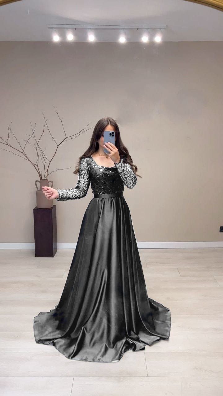 "Black Beauty: Exclusive Satin Silk Sequence Gown with Fancy Pattern and Tassel Detailing - Perfect for Parties, Weddings, and Special Events