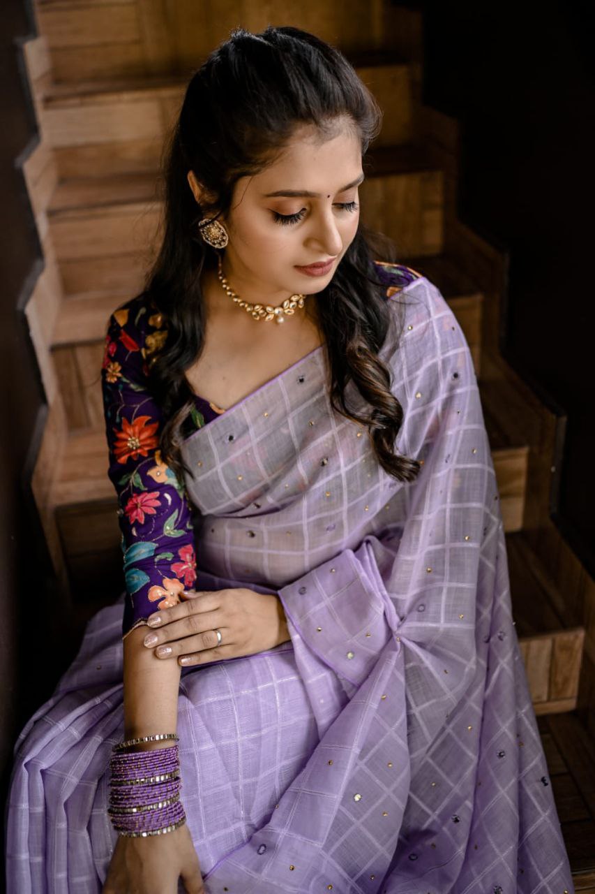 Lavender Linen Velvet Chex Saree with Aari Mirror & Stone Work and Upton Dolla Crape Printed Blouse