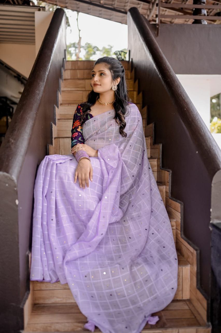 Lavender Linen Velvet Chex Saree with Aari Mirror & Stone Work and Upton Dolla Crape Printed Blouse