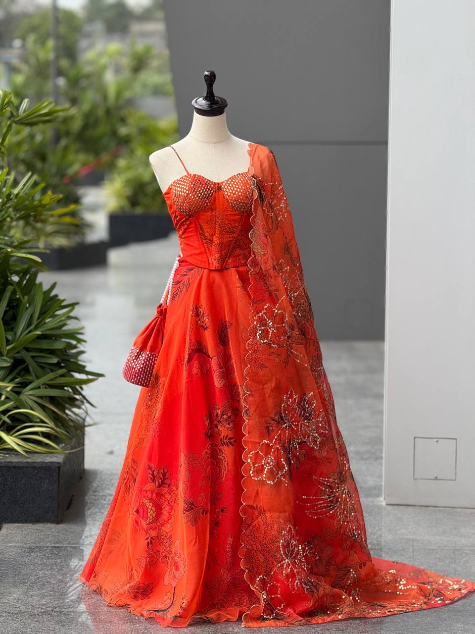 Elegant Digital Print Organza Lehenga ,Corset Blouse , Embroidered Dupatta and Batwa Purse