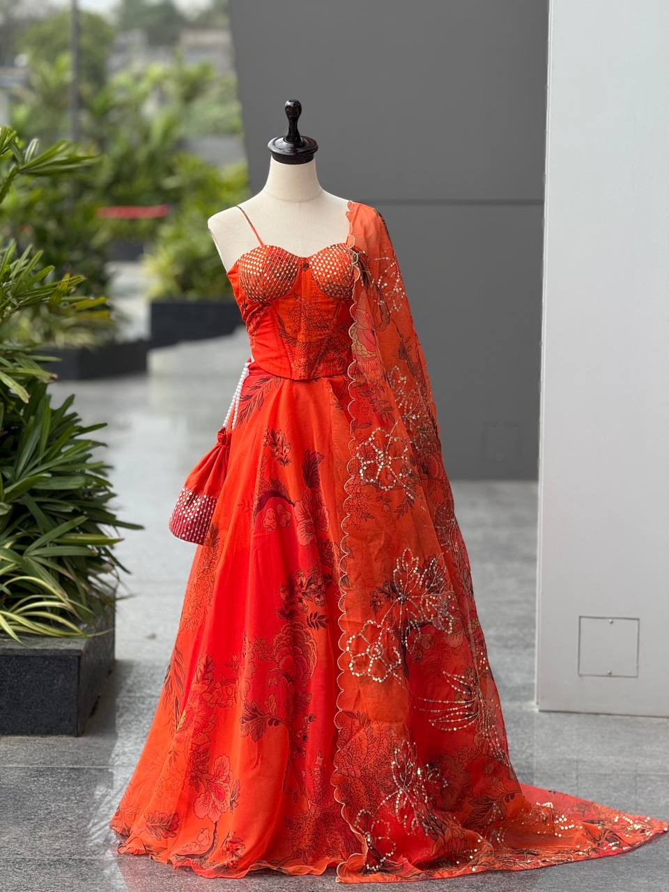 Elegant Digital Print Organza Lehenga ,Corset Blouse , Embroidered Dupatta and Batwa Purse