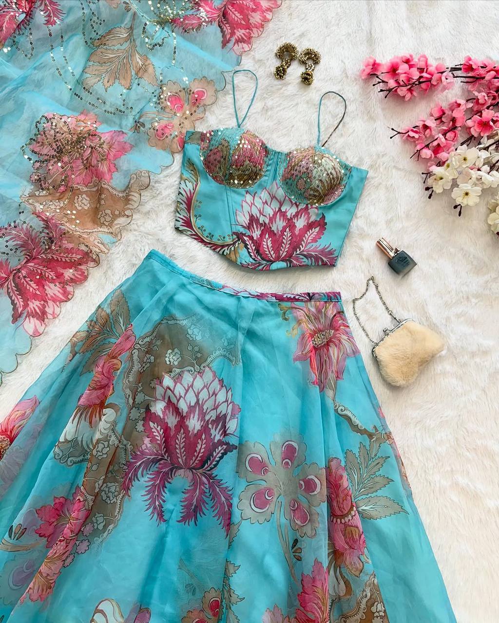 Elegant Digital Print Organza Lehenga ,Corset Blouse , Embroidered Dupatta and Batwa Purse