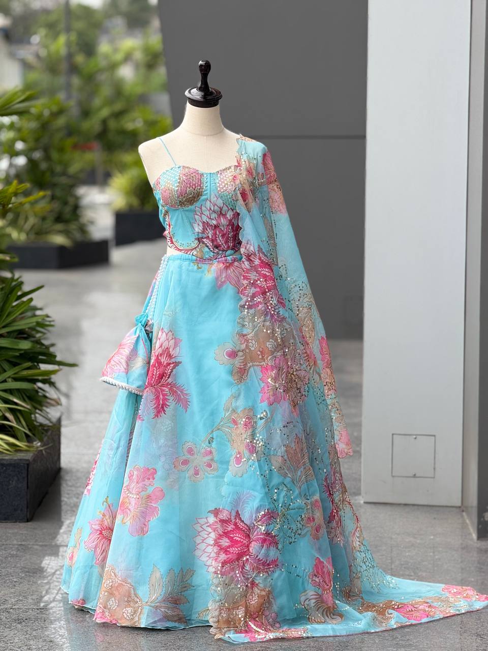 Elegant Digital Print Organza Lehenga ,Corset Blouse , Embroidered Dupatta and Batwa Purse