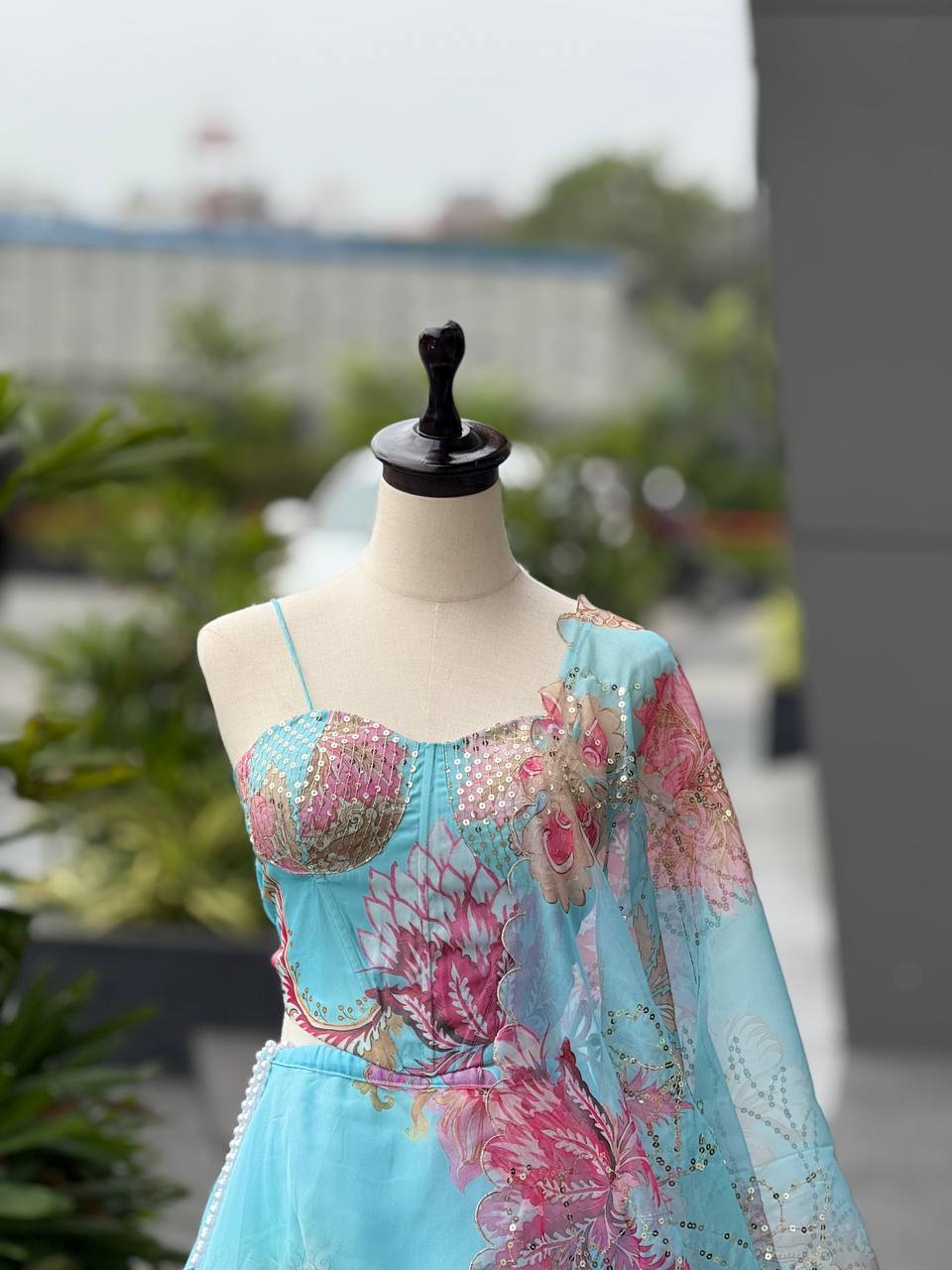 Elegant Digital Print Organza Lehenga ,Corset Blouse , Embroidered Dupatta and Batwa Purse