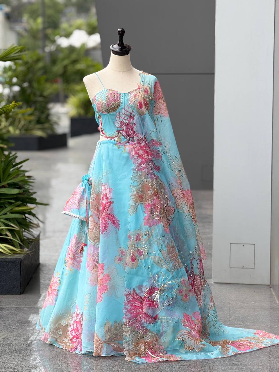 Elegant Digital Print Organza Lehenga ,Corset Blouse , Embroidered Dupatta and Batwa Purse