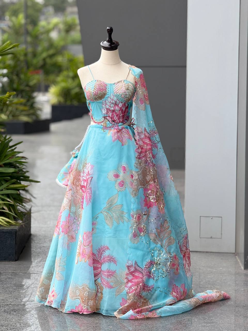 Elegant Digital Print Organza Lehenga ,Corset Blouse , Embroidered Dupatta and Batwa Purse