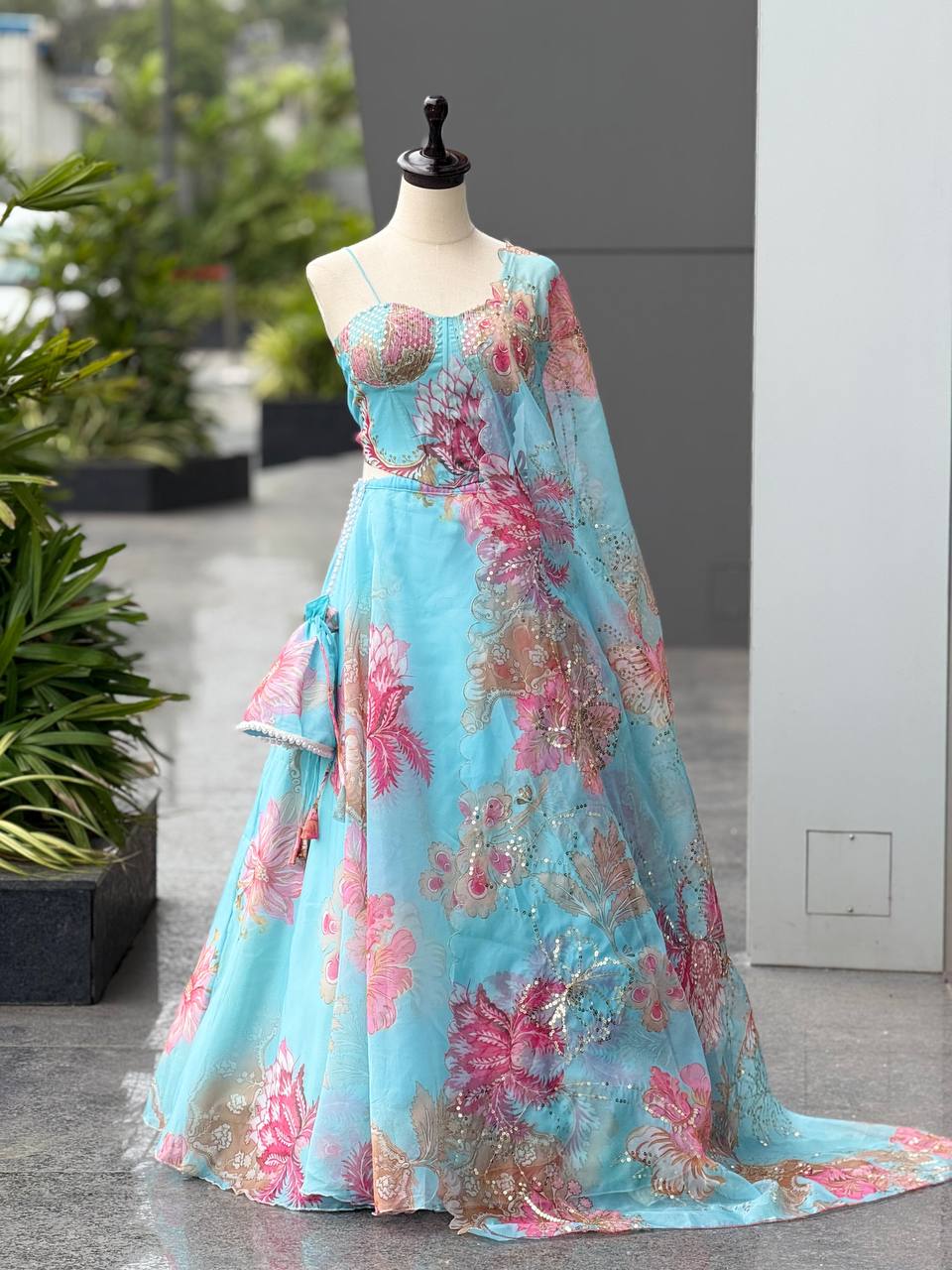 Elegant Digital Print Organza Lehenga ,Corset Blouse , Embroidered Dupatta and Batwa Purse