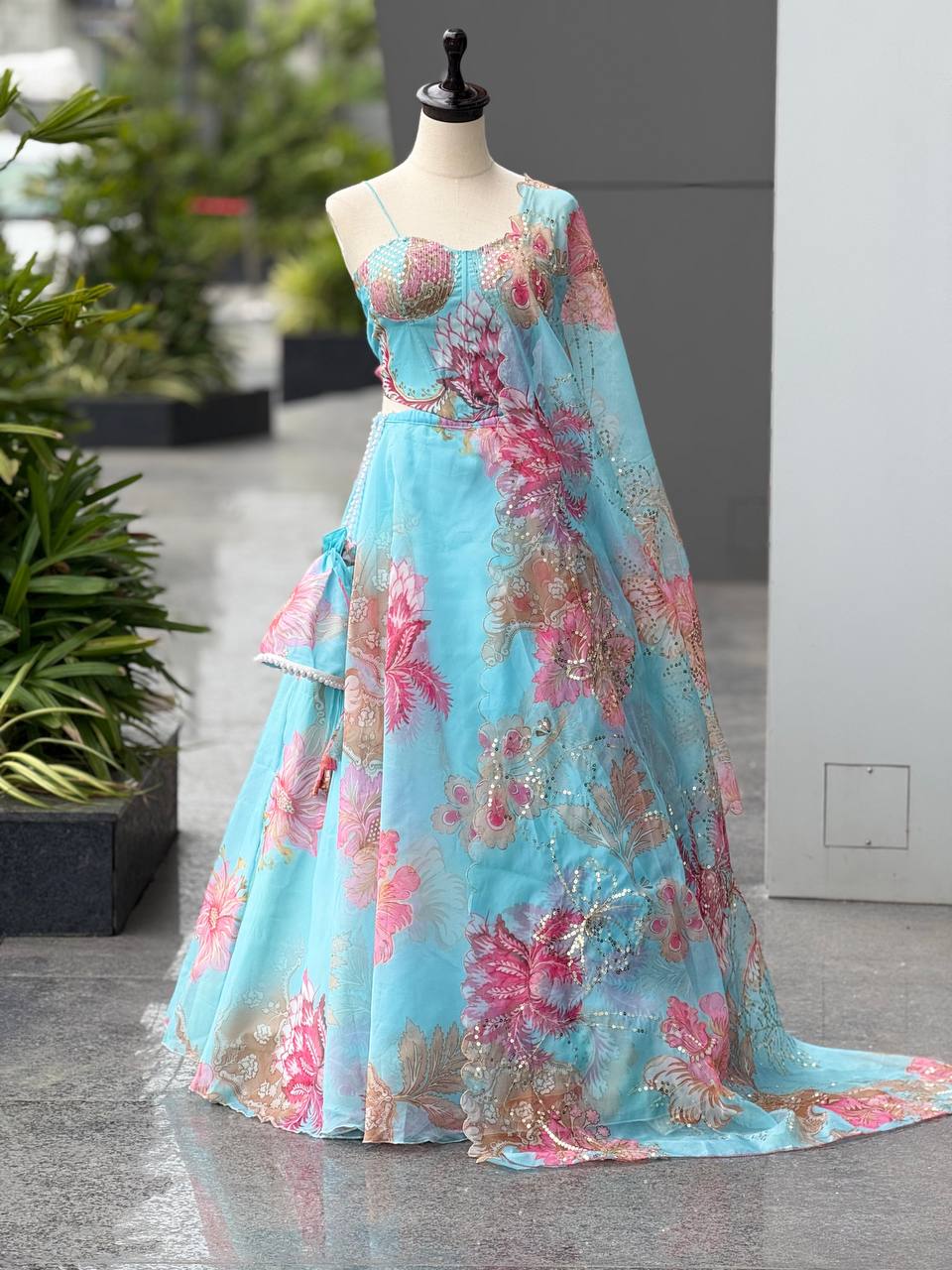 Elegant Digital Print Organza Lehenga ,Corset Blouse , Embroidered Dupatta and Batwa Purse