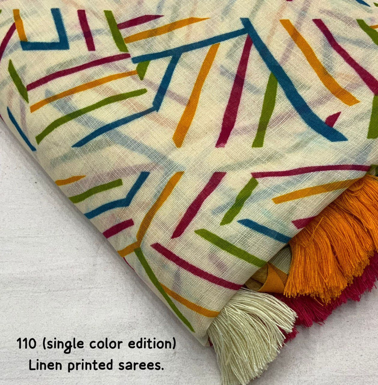 Soft Linen Saree with Geometric Print & Contrast Striped Blouse