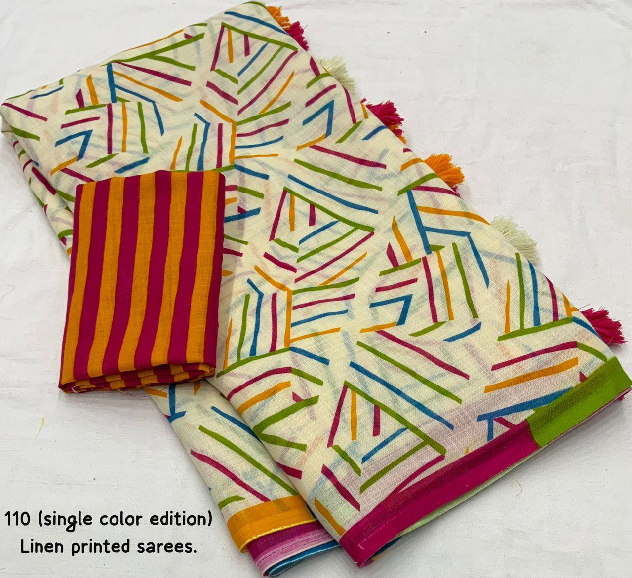 Soft Linen Saree with Geometric Print & Contrast Striped Blouse