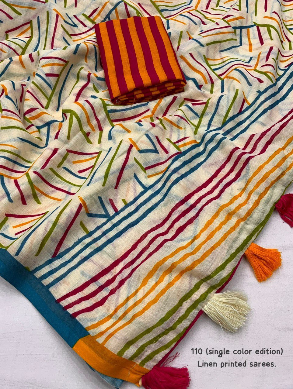 Soft Linen Saree with Geometric Print & Contrast Striped Blouse